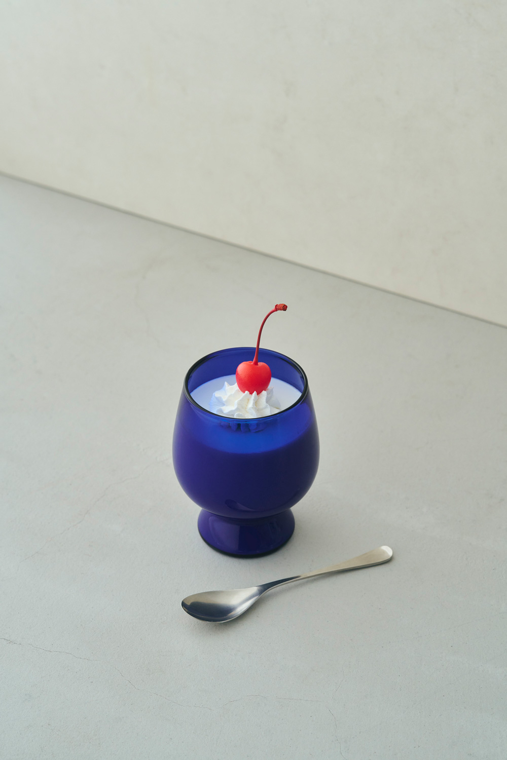 lifestyle GOBLET blue color with sweets cherry